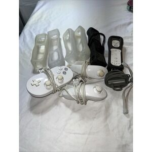 Wii Lot 6 Skins 2 Controllers 2 Nun Chucks And Game Pad